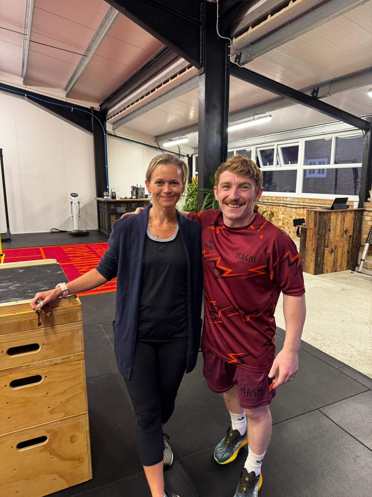Jenny with their coach at Magni Fitness